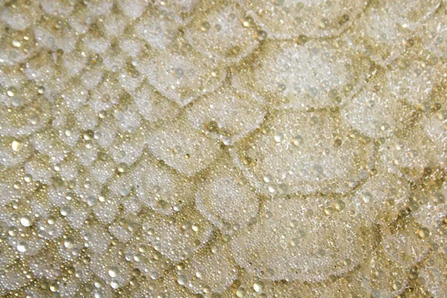 Welter-Perlen-Tapete im Snake-Skin-Dessin
